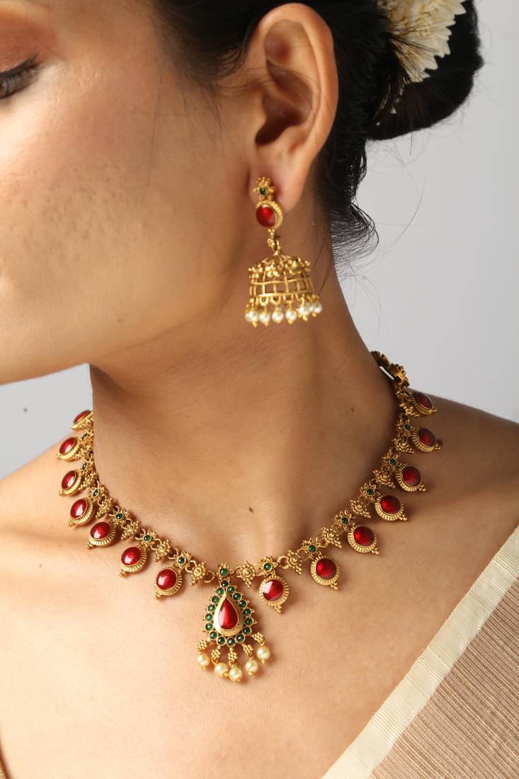 gold necklace with matching earrings 