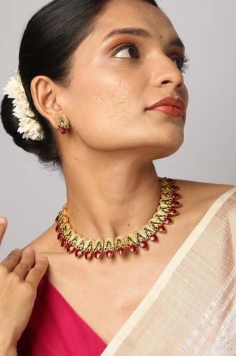 gold necklace with matching earrings 