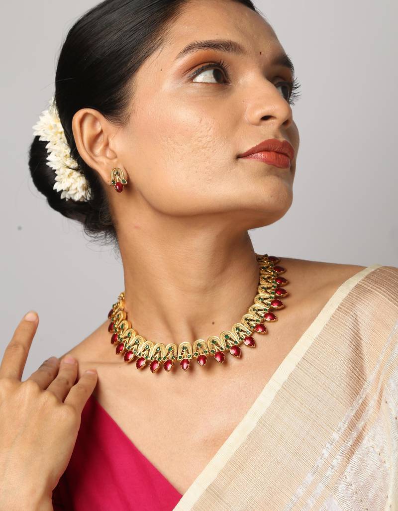 gold necklace with matching earrings 