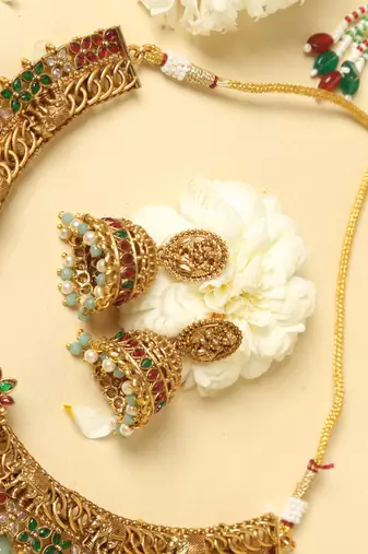 gold plated temple jewellery set with lakshmi motifs