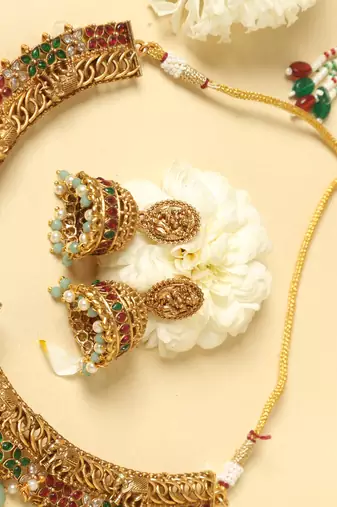gold plated temple jewellery set with lakshmi motifs