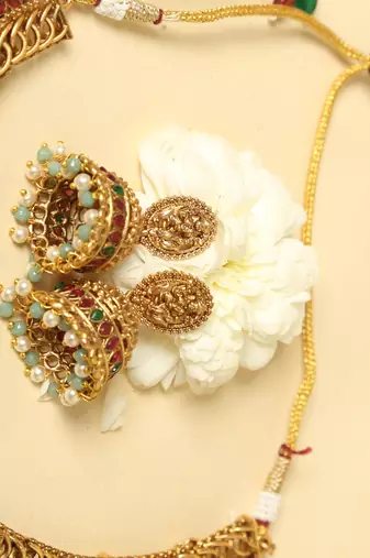 gold plated temple jewellery set with lakshmi motifs