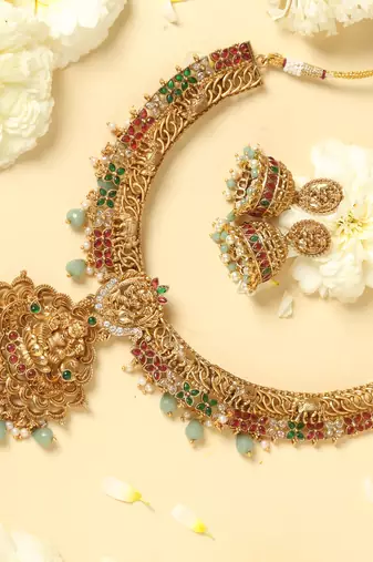 gold plated temple jewellery set with lakshmi motifs