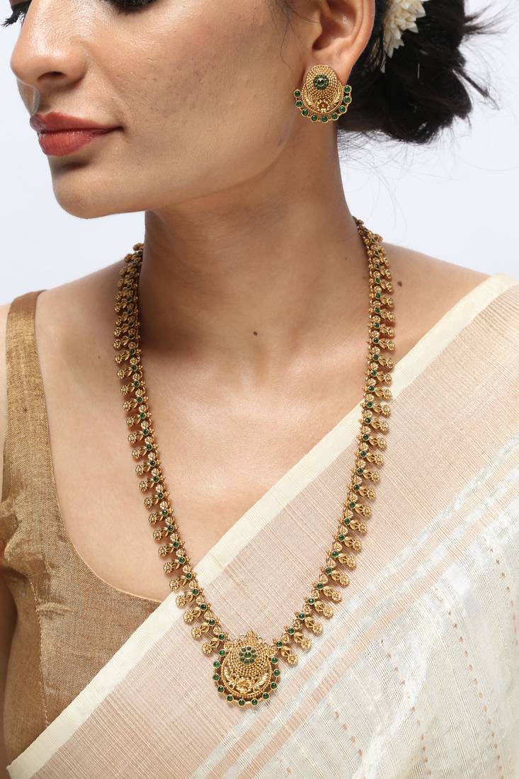 gold plated necklace set with emerald green stones