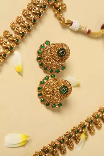 gold plated necklace set with emerald green stones
