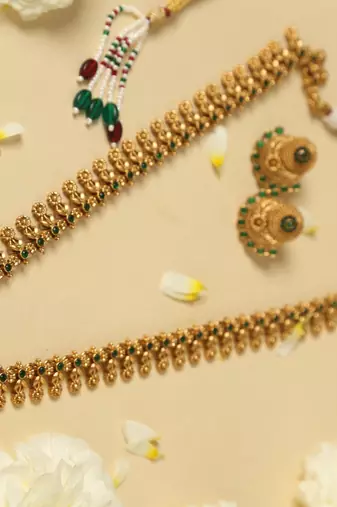 gold plated necklace set with emerald green stones