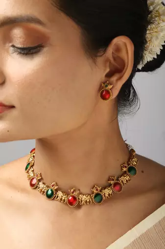 gold plated necklace set with elephant & ruby stones