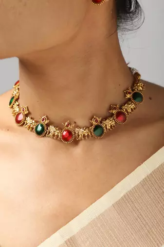 gold plated necklace set with elephant & ruby stones