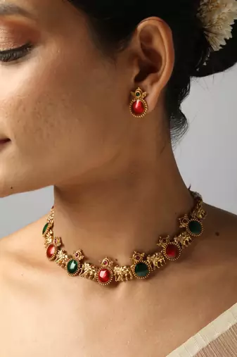 gold plated necklace set with elephant & ruby stones