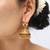 antique gold lotus jhumka 