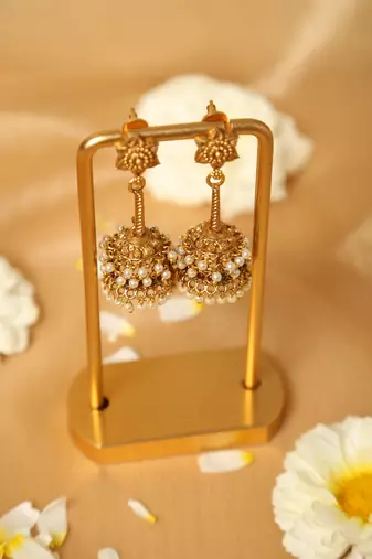 gold plated jhumka earrings with pearl accents