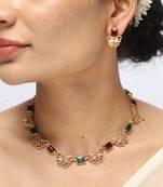 gold necklace with red & green stones