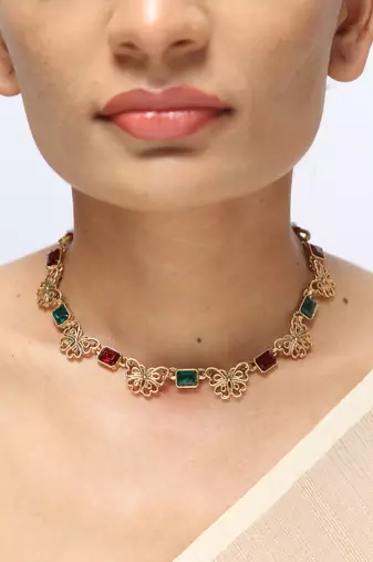 red green gold plated necklace with stone work