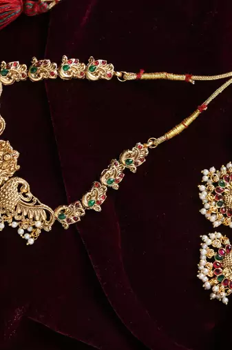 gold plated necklace set with temple jewellery work