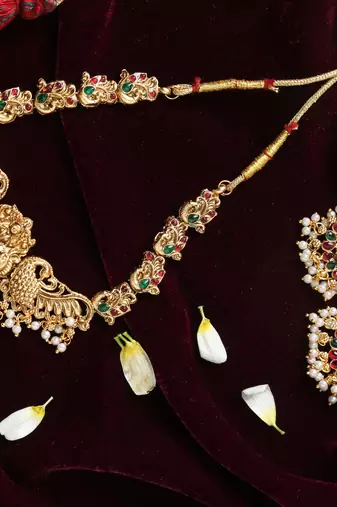 gold plated necklace set with temple jewellery work