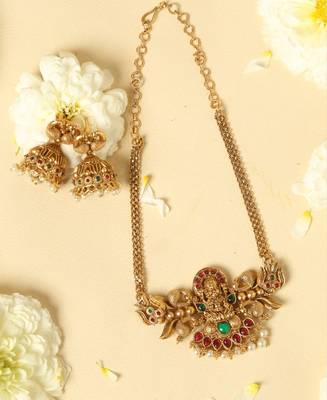 gold plated temple necklace set with lakshmi work 1