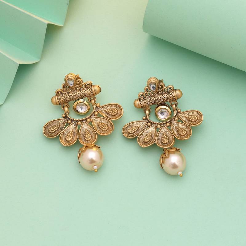 White color matte gold earrings