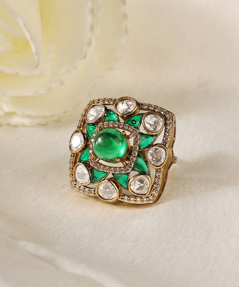 Gold plated kundan green stones ring