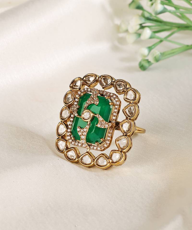 Gold plated kundan green stones ring