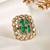 Gold plated kundan green stones ring