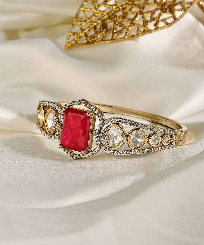 Gold plated kundan red stone bangle