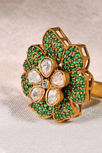 Gold plated kundan green stones ring