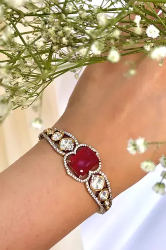 Gold plated kundan red stone bangle