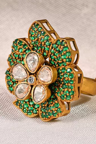 Gold plated kundan green stones ring