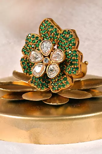 Gold plated kundan green stones ring