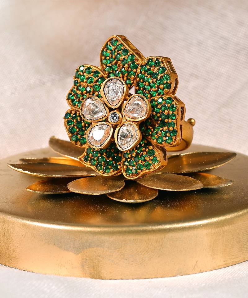 Gold plated kundan green stones ring