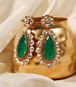 Gold plated kundan green stones dangler earrings