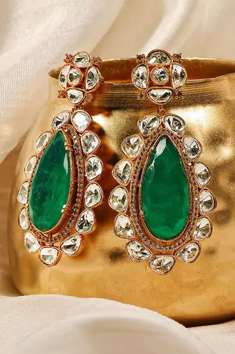 Gold plated kundan green stones dangler earrings