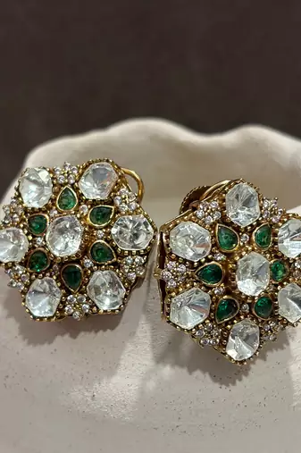 Gold plated kundan green stones stud earrings