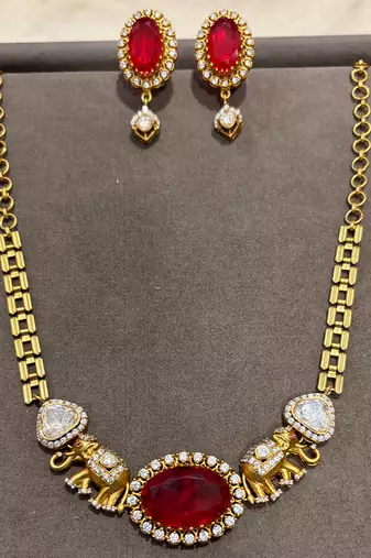Gold plated kundan red stones necklace set