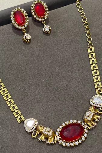Gold plated kundan red stones necklace set