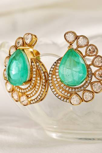 Gold plated kundan green stones stud earrings