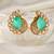 Gold plated kundan green stones stud earrings