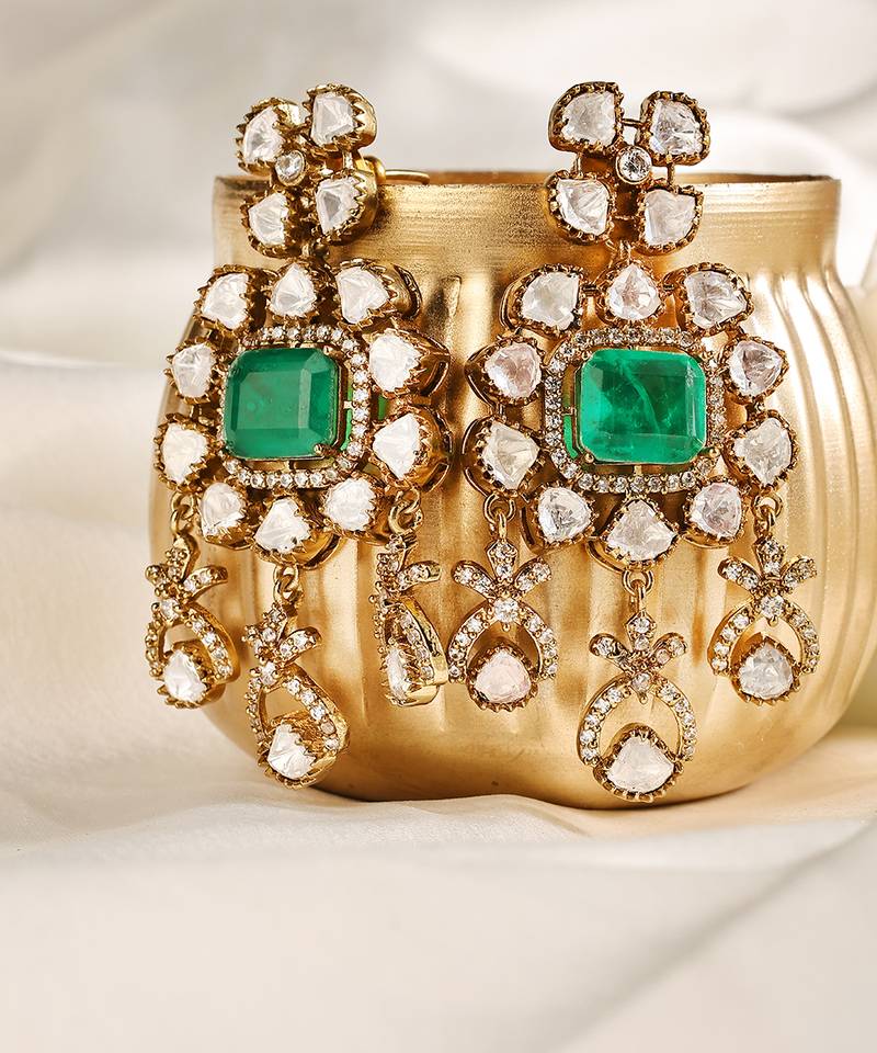 Gold plated kundan green stones dangler earrings