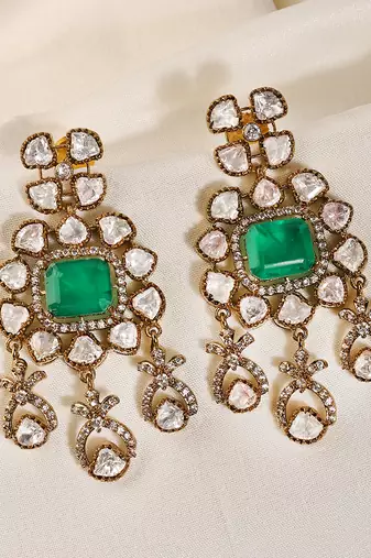 Gold plated kundan green stones dangler earrings