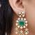 Gold plated kundan green stones dangler earrings