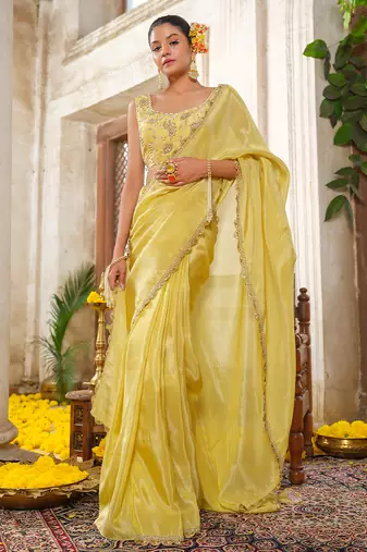Yellow embroidered tissue silk saree