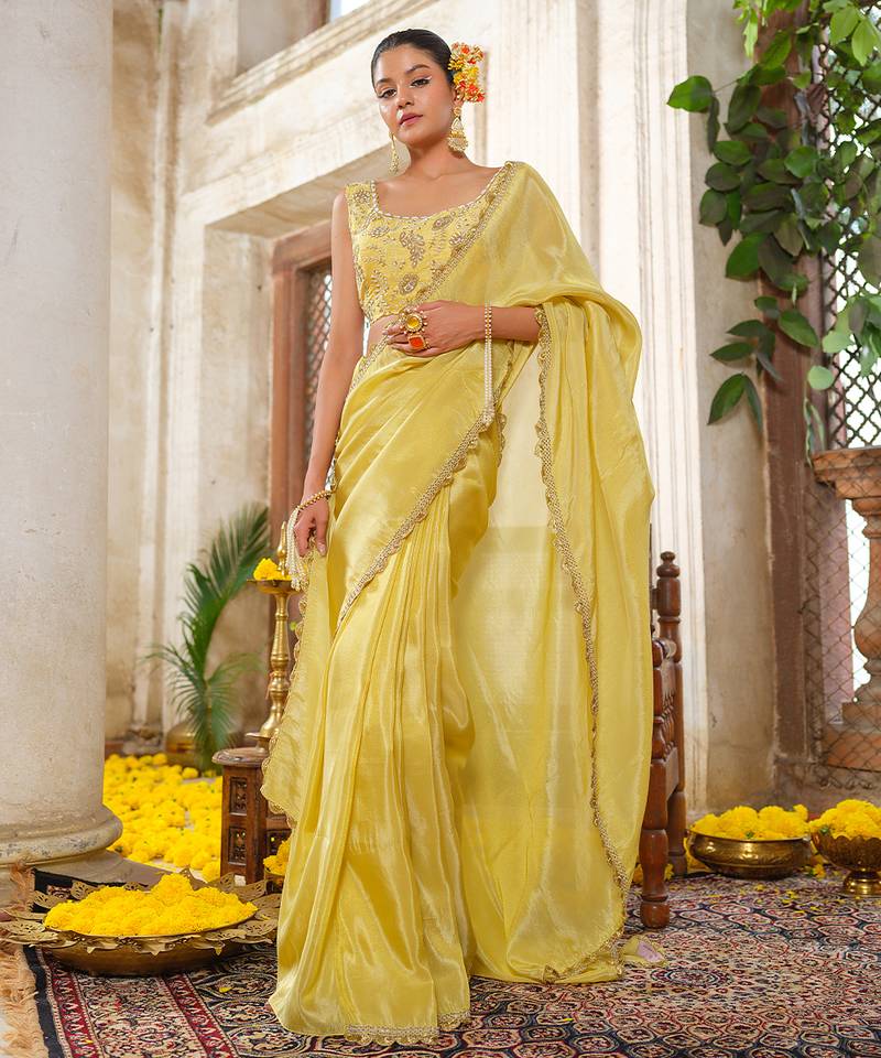 Yellow embroidered tissue silk saree