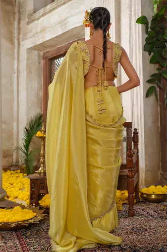 Yellow embroidered tissue silk saree