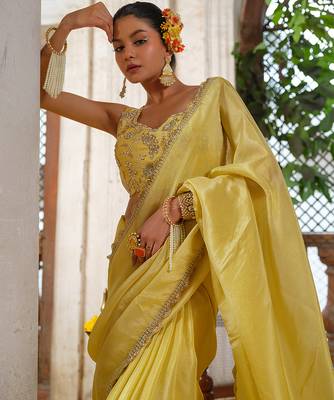 Yellow embroidered tissue silk saree 3