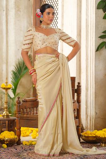 Ivory embroidered tissue silk saree