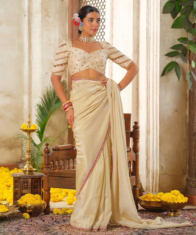 Ivory embroidered tissue silk saree