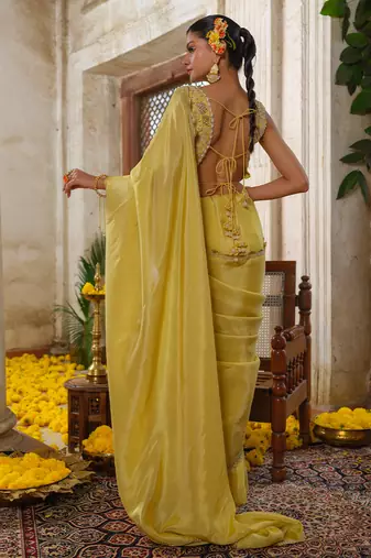 Yellow embroidered tissue silk saree