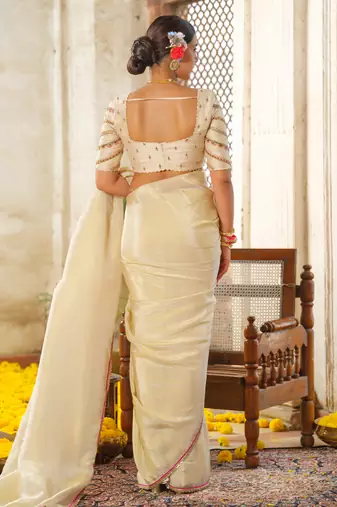 Ivory embroidered tissue silk saree