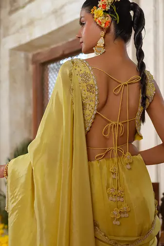 Yellow embroidered tissue silk saree