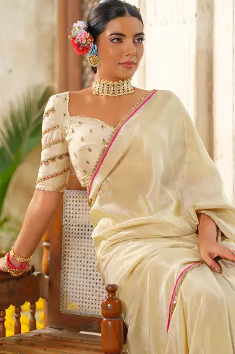 Ivory embroidered tissue silk saree